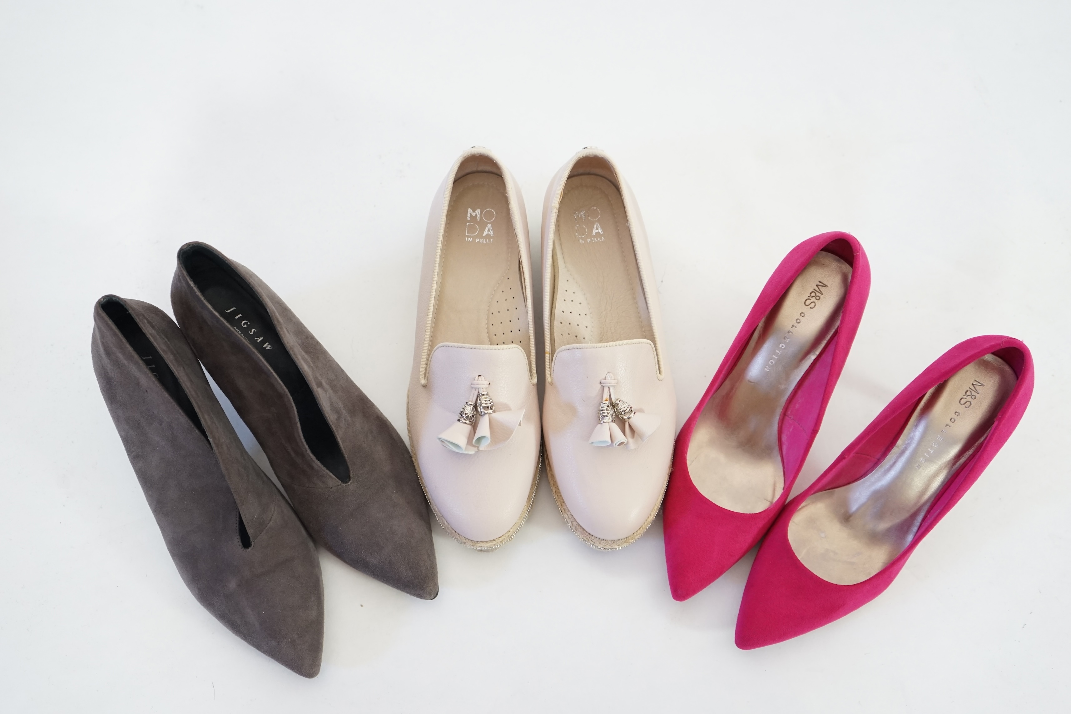 Three pairs of lady's shoes, Jigsaw V front shoe boot size 39, Marks & Spencer bright pink suede size 5.5 and a pair of Moda in Pelle buff platformed flats with metallic silver strip through sole. Proceeds to Happy Paws